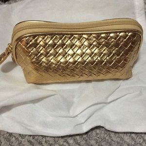 SOLD.                                                         NWOT golden clutch